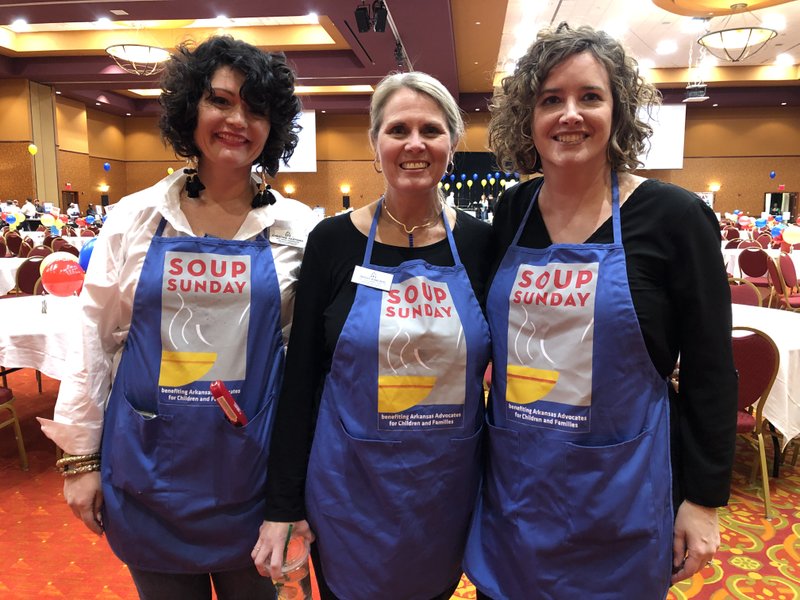 Courtesy photo Christine Hartman (from left), Missy Darwin Kincaid and Laura King Kellams, all members of the Northwest Arkansas staff at Arkansas Advocates for Children and Families, pause at Soup Sunday Jan. 27 at the John Q. Hammons Center in Rogers. "Soup Sunday was a fabulous event, with The Cocktail Club providing musical entertainment," says Kincaid. "Channing Barker and Kyle Kellams served as our emcees and led some awesome children's activities ranging from the Chicken Dance to the limbo. The mission of Arkansas Advocates for Children and Families is to ensure that all children and their families have the resources and opportunities to lead healthy and productive lives and to realize their full potential." Information: Email mkincaid@aradvocates.org.