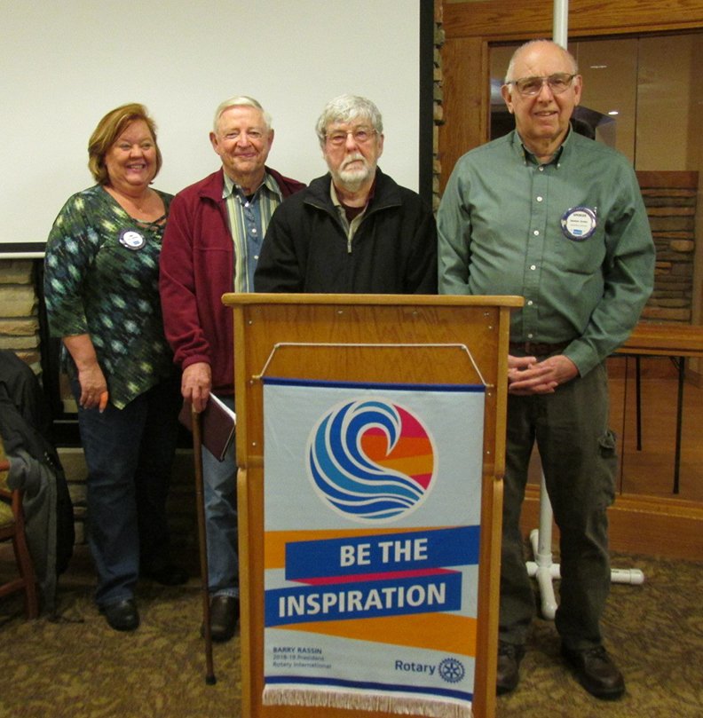 Submitted photo COMPUTER PROGRAM: From left, Hot Springs Village Rotary Club President Lori McMinn welcomes Bob McClesky and Loren Loberg of Computers 4 Kids with Rotarian of the Day Spence Jordan.