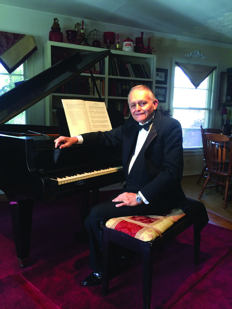 Pianist: Roger Lawson in his home studio. He will perform a piano recital featuring Romantic-era composers tomorrow evening at the South Arkansas Arts Center.