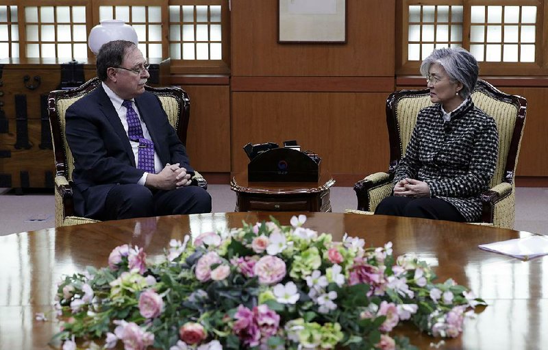 U.S. State Department negotiator Timothy Betts (left) talks with South Korean Foreign Minister Kang Kyung-wha during their meeting Sunday in Seoul, South Korea.