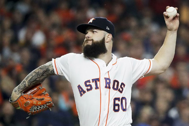 Former Arkansas Razorback Dallas Keuchel is among several big name major leaguers still looking for jobs as spring training be- gins this week.