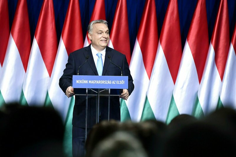 Hungarian Prime Minister Viktor Orban delivers his annual "State of Hungary" speech in Budapest, Hungary, Sunday, Feb. 10, 2019. The inscription reads: "For us Hungary is the first!"
