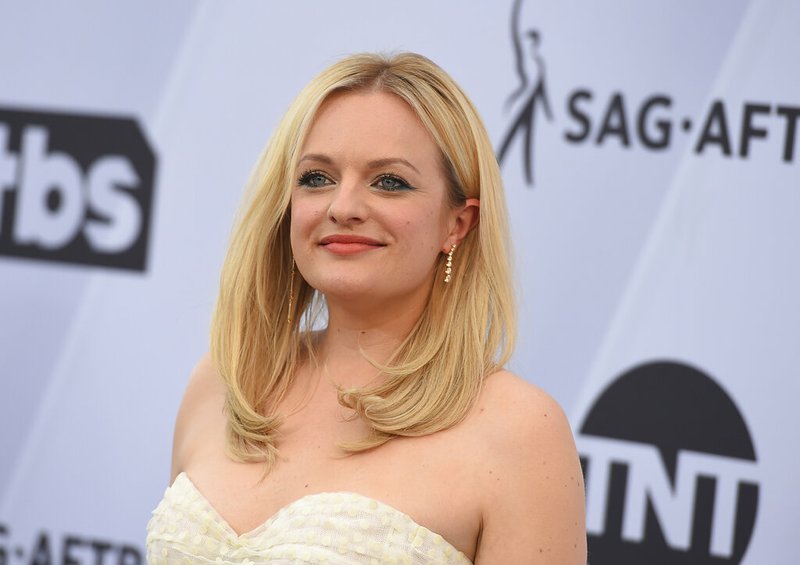 In a Jan. 27, 2019 file photo, Elisabeth Moss arrives at the 25th annual Screen Actors Guild Awards at the Shrine Auditorium &amp; Expo Hall, in Los Angeles. Hulu said Monday, Feb. 11, 2019 that the dystopian drama "The Handmaid's Tale" will debut three new episodes on Wednesday, June 5. (Photo by Jordan Strauss/Invision/AP, File)