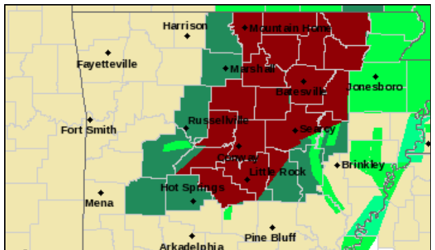 The areas in dark red were under flash flood warnings shortly before noon Monday. The areas in dark green are under a flood watch while the areas in light green are under flood warnings. 