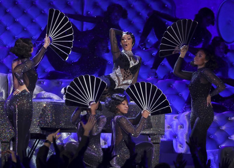 Cardi B performs &quot;Money&quot; at the 61st annual Grammy Awards on Sunday, Feb. 10, 2019, in Los Angeles. (Photo by Matt Sayles/Invision/AP)