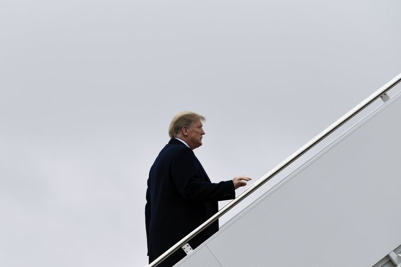 President Donald Trump walks up the steps of Air Force One at Andrews Air Force Base in Md., Monday, Feb. 11, 2019. Trump is heading to El Paso, Texas, to try and turn the debate over a wall at the U.S.-Mexico border back to his political advantage as his signature pledge to American voters threatens to become a model of unfulfilled promises. (AP Photo/Susan Walsh)