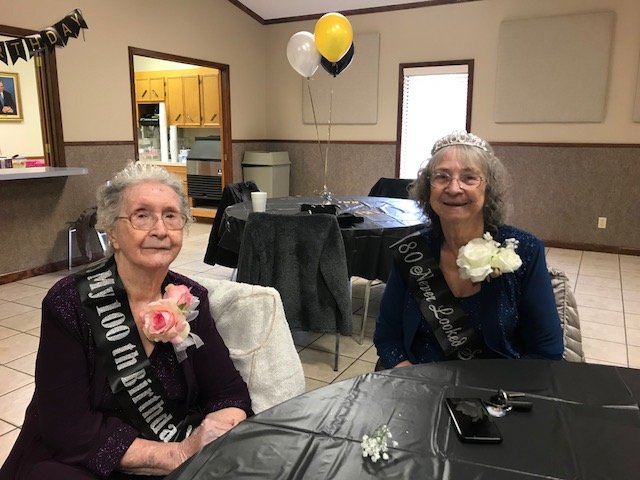 Happy Birthday: Edielene Beeson Goode Zacher, and her daughter, Laketa, pose together at their birthday celebration at First Baptist Church in Parkers Chapel on Saturday. Edielene turns 100 today and Laketa turns 80. Contributed photo