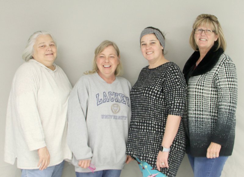 LYNN KUTTER ENTERPRISE-LEADER Leaders for a new women's group called Gals of the Grove are Julie Tandy, left, Lane Davis, Kasi Sears and Janece Vines. The group was formed to provide a place for women to make friends.