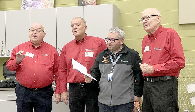 Photo submitted Osage Creek Elementary School music teacher Ken Timbrel sings &#x201c;Let Me Call You Sweetheart&#x201d; with Wayne Wentworth, Ed Barlow and Jim Nugent after receiving classroom sets of &#x201c;Get. America Singing...Again&#x201d; songbooks.