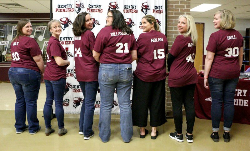 Submitted/BRENTLY WADE Leslee Holt Beeler (10), Keeley Rife Buckley (22), Bobbi Ward Sligar (24), Wendy Dillahunty Jackson (21), Carrie Nolan Clauson (15), Jennifer Webster Ellis-Lundholm (40), Dr. Cheryl Hull (30) were honored at the Feb. 5 home game of the Gentry Lady Pioneers. The 1989 basketball team won the state championship. Absent on Feb. 5 were Coach Scottie Nolan and players April Hall, Missy Boroughs, Tracy Smith Kincy, Dr. Lori Frye Nolan, Jodye Saunders Pool and Allyson Twiggs Dyer.