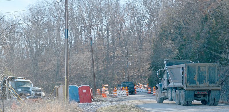 Keith Bryant/The Weekly Vista Trucks haul material into the Hull Dermatology construction site alongside Sunset Drive.