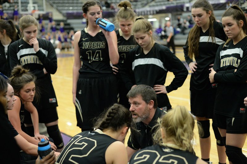NWA Democrat-Gazette/ANDY SHUPE Bentonville coach Tom Halbmaier speaks to his team Tuesday, Feb. 12, 2019, during the first half against Fayetteville in Bulldog Arena in Fayetteville. Visit nwadg.com/photos to see more photographs from the games.