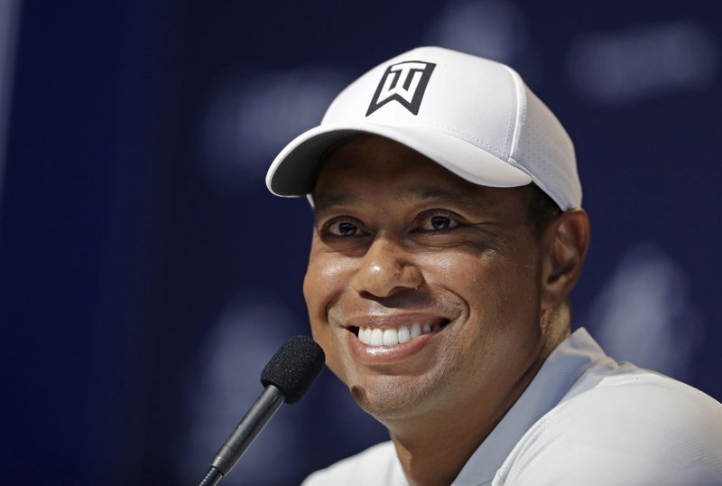 Tiger Woods responds to a question during a news conference at the PGA Championship golf tournament at Bellerive Country Club, Tuesday, Aug. 7, 2018, in St. Louis. 