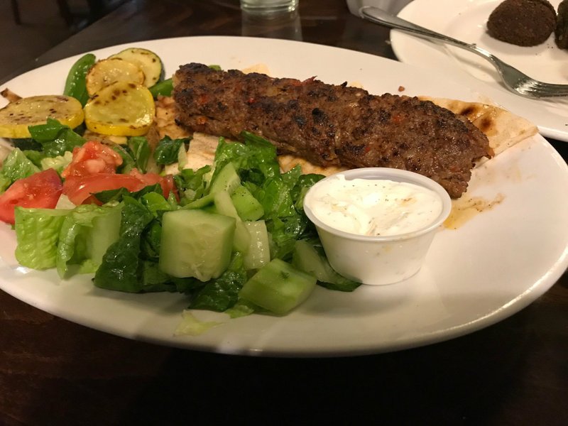 Arkansas Democrat-Gazette/HELAINE R. WILLIAMS
The Adana Shish Kebab comes with Mediterranean salad and mixed vegetables or fries.