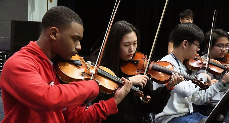 The Sentinel-Record/Grace Brown SWEET SOUNDS: First violins Keenan Peet, of Pine Bluff, and Victoria Hwang, of the Arkansas School for Mathematics, Sciences, and the Arts, rehearse Wednesday in Horner Hall of the Hot Springs Convention Center during the All-State Music Conference. The conference starts today with the first of several public concerts taking place today at 7:30 p.m. in Horner Hall.