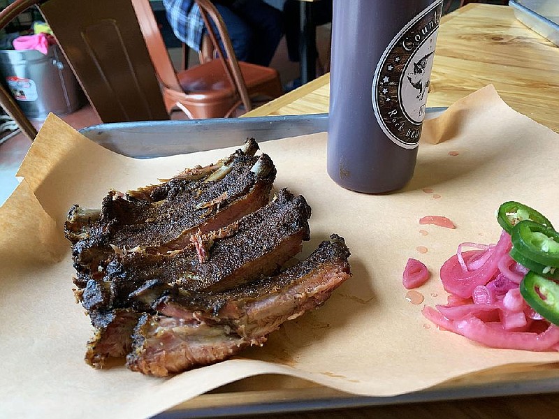 Quarter rack of ribs at Count Porkula. The barbecue restaurant in the Rail Yard is planning a second location on Keightly Drive in Little Rock’s Pulaski Heights in partnership with JTJ Restaurants. (Democrat-Gazette file photo/Eric E. Harrison)