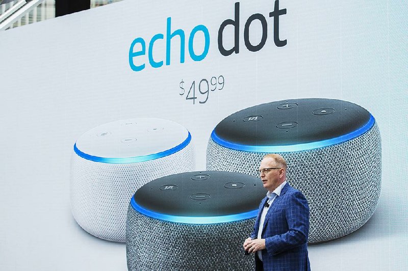 David Limp, a senior vice president at Amazon.com Inc., presents  the Amazon Echo Dot  smart speaker during an event at the company’s Spheres headquarters in Seattle in September. 