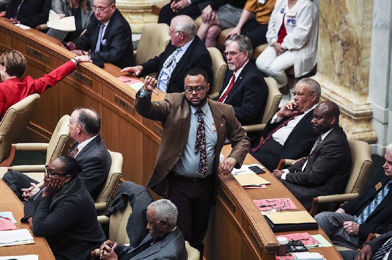 House Minority Leader Charles Blake of Little Rock speaks against Senate Bill 211 before Thursday’s vote. He said it didn’t make sense to cut income taxes and then propose a referendum on a sales tax increase. “I’m not inclined to say that the people are going to vote for that half-cent sales tax, so it leaves us in a sticky situation of having to fund highways and having to find resources to fund services,” Blake said.