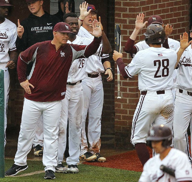 Coach Chris Curry (left) and the University of Arkansas at Little Rock hit the ground running to start the season, with series against Creighton and Oklahoma State in the first week, as well as games against Ole Miss, Mississippi State, Oral Roberts and Arkansas.