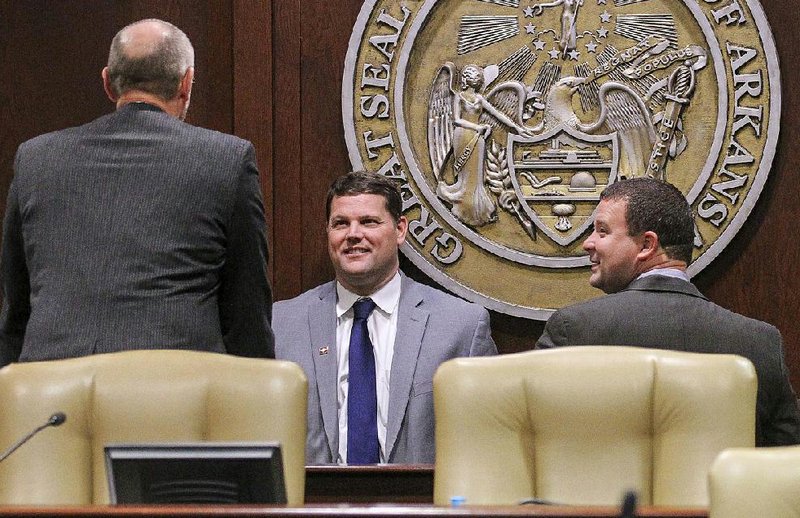 Rep. Justin Gonzales (right) , R-Okolona, is shown in this file photo with Sen. Bart Hester (center), R-Cave Springs during a Joint Budget Committee session. 