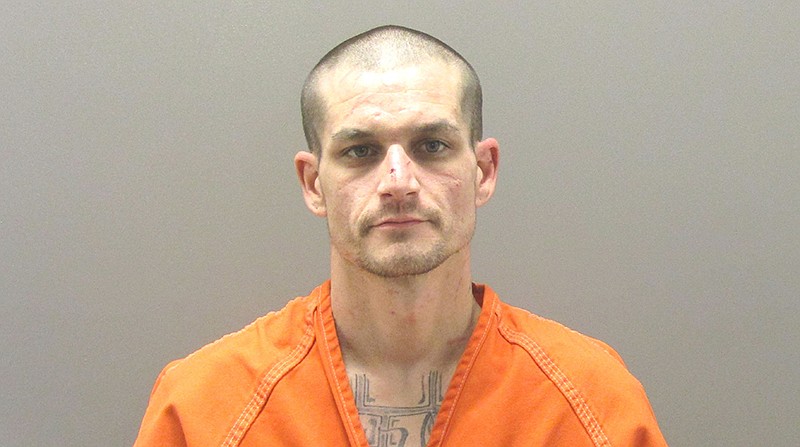 Wanted suspect arrested after fleeing from traffic stop, brief manhunt ...