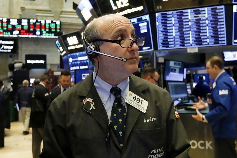 In this Feb. 5, 2019, file photo trader Andrew Silverman works on the floor of the New York Stock Exchange. The U.S. stock market opens at 9:30 a.m. EST on Friday, Feb. 15. (AP Photo/Richard Drew, File)