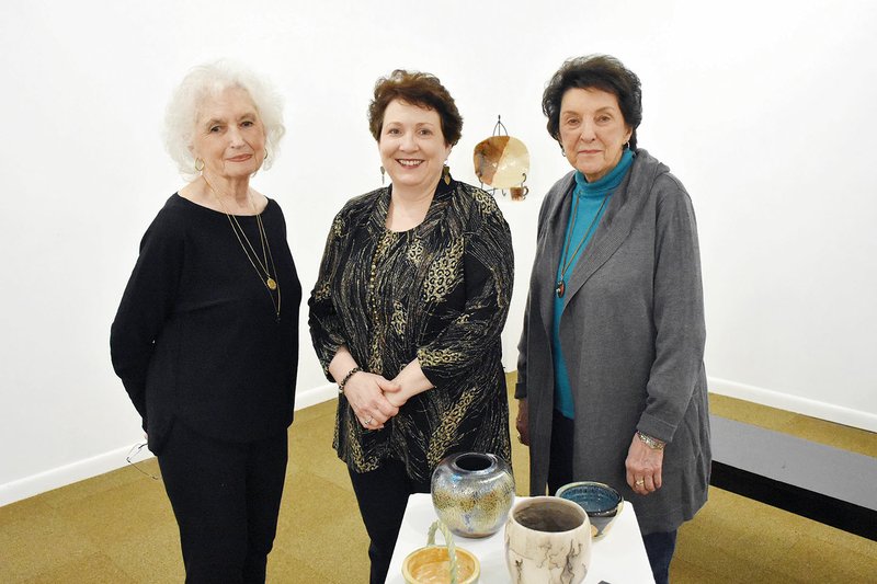 The River Valley Arts Center will present the 12th annual Beaux Arts Awards ceremony March 2. Among those to be inducted are, from left, Toni Bachman, Mary Clark and Paula Sanders Steel. The honorees are shown here in a gallery at the arts center where works are currently on display by student potters, who have taken classes from River Valley Arts Center Artist-in-Residence Winston Taylor, who designed the award that is given to the honorees.