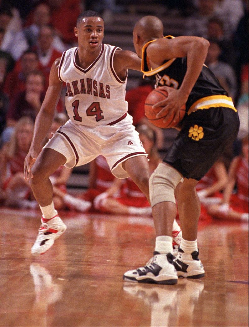 Arkansas guard Corey Beck (left) defends Missouri’s Julian Winfield during a Dec. 2, 1993, game at Walton Arena in Fayetteville. Beck was named the Razorbacks’ SEC legend this year, it was announced Friday by the conference office.