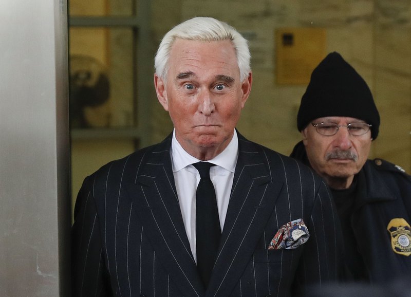 In this Feb. 1, 2019 photo, former campaign adviser for President Donald Trump, Roger Stone, leaves federal court in Washington.  (AP Photo/Pablo Martinez Monsivais)