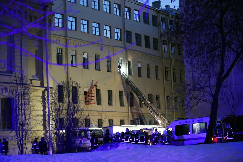 Russian Emergency employees work at the scene of the collapse building of the Saint Petersburg National Research University of Information Technologies, Mechanics and Optics in St. Petersburg, Russia, Saturday, Feb. 16, 2019. Russian emergency authorities say several floors of a university building in Russia’s second-largest city have collapsed. There was no immediate information on casualties.