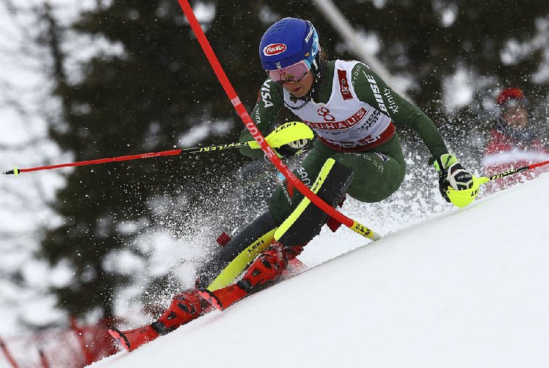 Mikaela Shiffrin of the United States competes on her way to the world championship slalom title Saturday in Are, Sweden, becoming the first Alpine skier — male or female — to win the same event at four consecutive world title events. 
