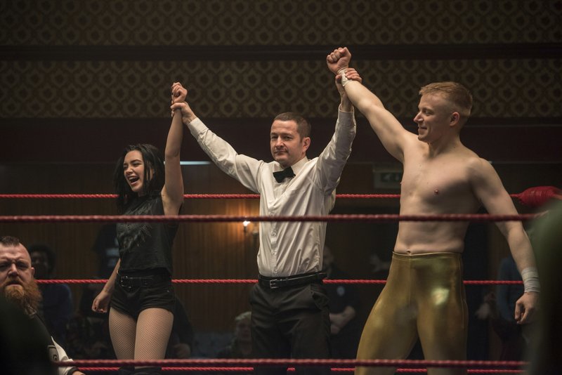 This image released by Metro Goldwyn Mayer Pictures shows Florence Pugh, left, and Jack Lowden, right, in a scene from "Fighting with My Family." (Robert Viglasky/Metro Goldwyn Mayer Pictures via AP)