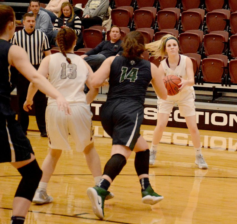 Graham Thomas/Siloam Sunday Siloam Springs sophomore Jadyn Still prepares to take a 3-point shot Friday against Little Rock Christian at Panther Activity Center.