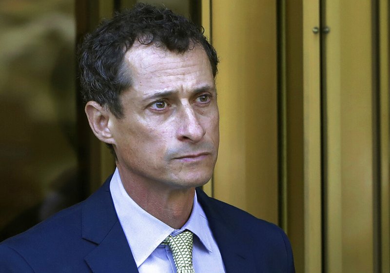 In this Sept. 25, 2017 file photo, former Congressman Anthony Weiner leaves federal court following his sentencing in New York. Weiner has been released from federal prison in Massachusetts. The New York Democrat, a once-rising star who also ran for mayor, was convicted of having illicit online contact with a 15-year-old North Carolina girl in 2017. The Federal Bureau of Prisons website now shows Weiner is in the custody of its Residential Re-entry Management office in Brooklyn, New York. It's not immediately clear when he was transferred and where he's currently staying. The bureau, federal court in New York and Weiner's lawyer didn't immediately comment. (AP Photo/Mark Lennihan, File)
