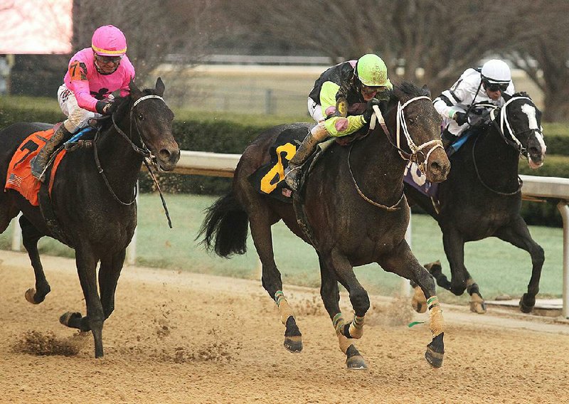 ockey Terry Thompson guides Super Steed (center) over the wire in front of Sueno and jockey Corey Lanerie (left), and Long Range Toddy (right) and Richard Eramia to win the Southwest Stakes on Monday at Oaklawn Park in Hot Springs.