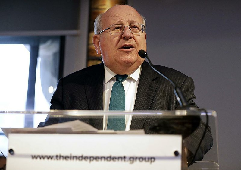 British lawmaker Mike Gapes speaks Monday during a news conference to announce the formation of The Independent Group in London. 