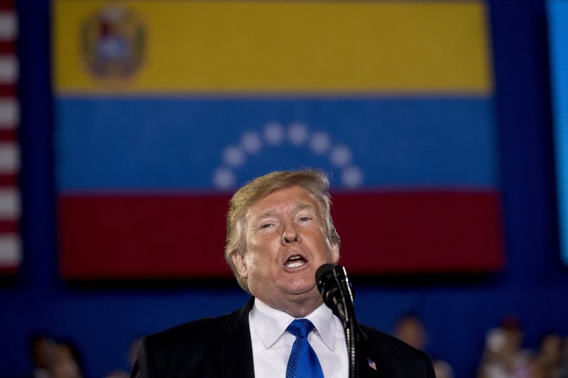 President Donald Trump speaks to a Venezuelan American community at Florida Ocean Bank Convocation Center at Florida International University in Miami, Fla., Monday, Feb. 18, 2019, to speak out against President Nicolas Maduro's government and its socialist policies. (AP Photo/Andrew Harnik)
