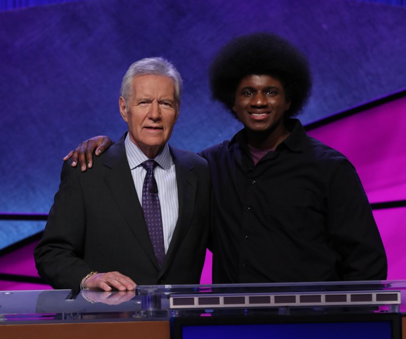 Leonard Cooper and Alex Trebek pose for a photo. (Photo courtesy to Jeopardy Productions, Inc.)

