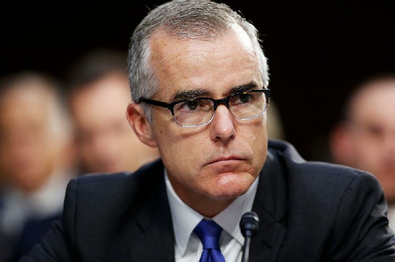 In this June 7, 2017, file photo, then-FBI acting director Andrew McCabe listens during a Senate Intelligence Committee hearing about the Foreign Intelligence Surveillance Act, on Capitol Hill in Washington.  