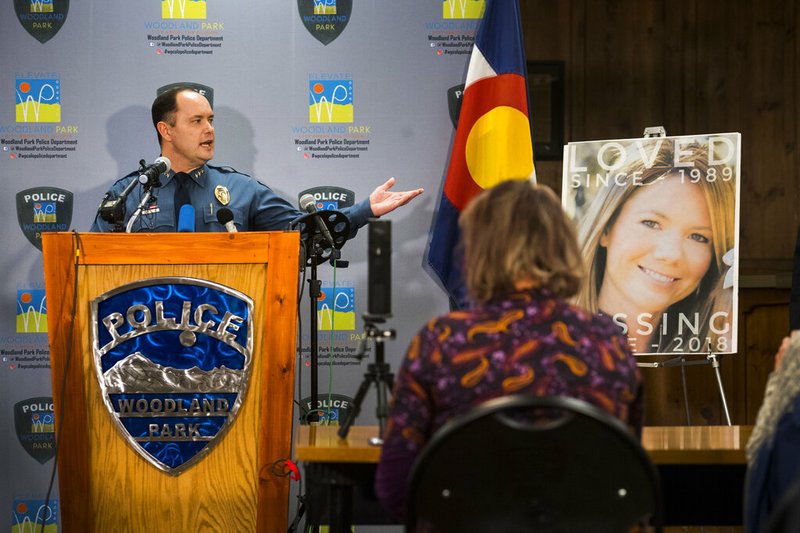 In this Dec. 21, 2018, file photo, Woodland Park Police Chief Miles De Young speaks about the arrest of Patrick Frazee in the murder of his fiance Kelsey Berreth, seen right, who has been missing since Thanksgiving, at the Woodland Park, Colo., City Hall. Additional charges have been filed against Frazee, charged with murder and solicitation to commit murder in the death of his missing fiancee, prosecutors said Tuesday, Feb. 19, 2019. (Christian Murdock/The Gazette via AP, File)