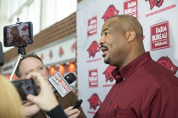 Arkansas defensive tackles coach Kenny Ingram speaks to reporters on Thursday, Feb. 21, 2019, at Fred W. Smith Center in Fayetteville. 