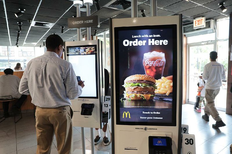 McDonald’s is rolling out ordering kiosks in many of its restaurants across the country. The company has also created the role of “guest experience leader” to help customers navigate the kiosks. 