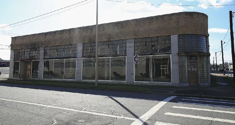 Polk Stanley Wilcox Architects is renovating the Winchester Auto Store at Eighth and Spring streets in downtown Little Rock and plans to move into the building, which was recently added to the National Register of Historic Places. 