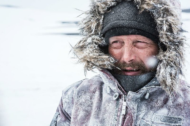 Overgard (Mads Mikkelsen) is a man stranded in a frozen wasteland who must decide whether to stay in the relative safety of his camp or try to trek his way back to civilization in Arctic.