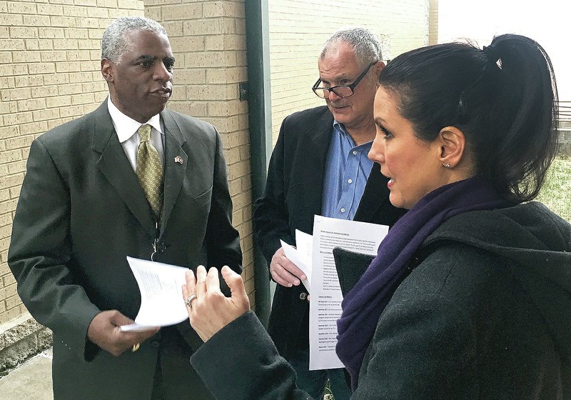 NWA Democrat-Gazette/TOM SISSOM Washington County Judge Joseph Wood (from left) discusses the proposed Crisis Stabilization Unit with Justices of the Peace Butch Pond and Lisa Ecke on Thursday in Fayetteville.