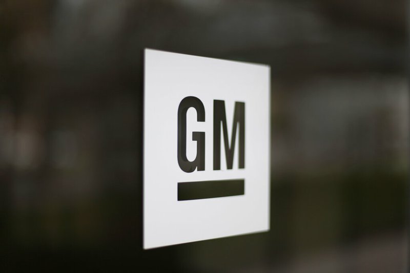 This May 16, 2014, file photo, shows the General Motors logo at the company's world headquarters in Detroit. General Motors is extending the life of its only Detroit factory until early next year. The plant on the border of Detroit and the hamlet of Hamtramck was to stop making vehicles as of June 1. (AP Photo/Paul Sancya, File)