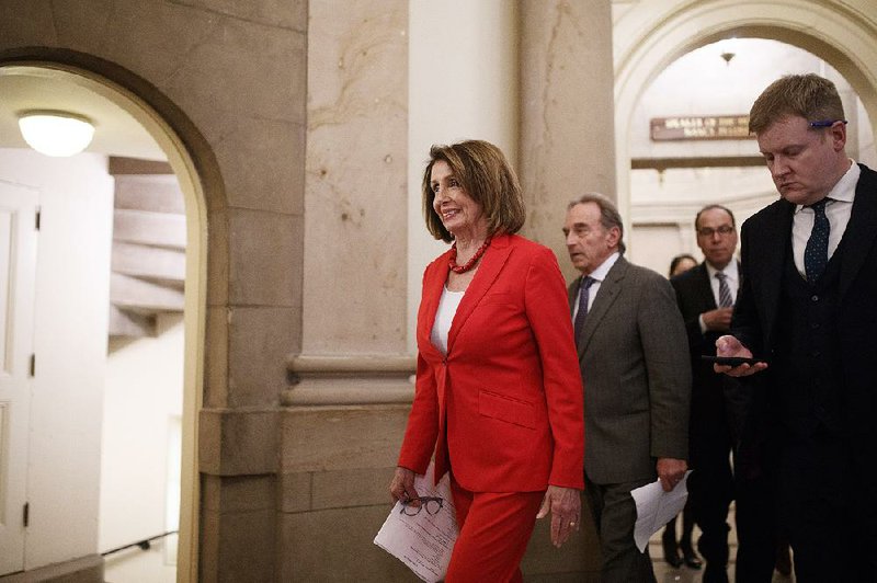 House Speaker Nancy Pelosi (D-Calif.) heads to the floor for a vote on Capitol Hill, in Washington, Feb. 7, 2019. 