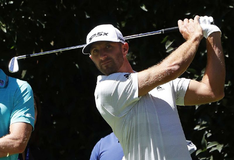 Dustin Johnson hits the ball during a pactice prior the WGC-Mexico Championship at the Chapultepec Golf Club in Mexico City, Wednesday, Feb. 20, 2019. (AP Photo/Marco Ugarte)