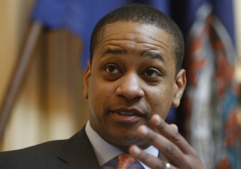 Virginia Lt. Gov. Justin Fairfax presides over the Senate session at the Capitol in Richmond, Va., Friday, Feb. 22, 2019. The chairman of the House Courts of Justice committee announced that they will hold a hearing on the sexual accusations that have been placed against Fairfax. (AP Photo/Steve Helber)
