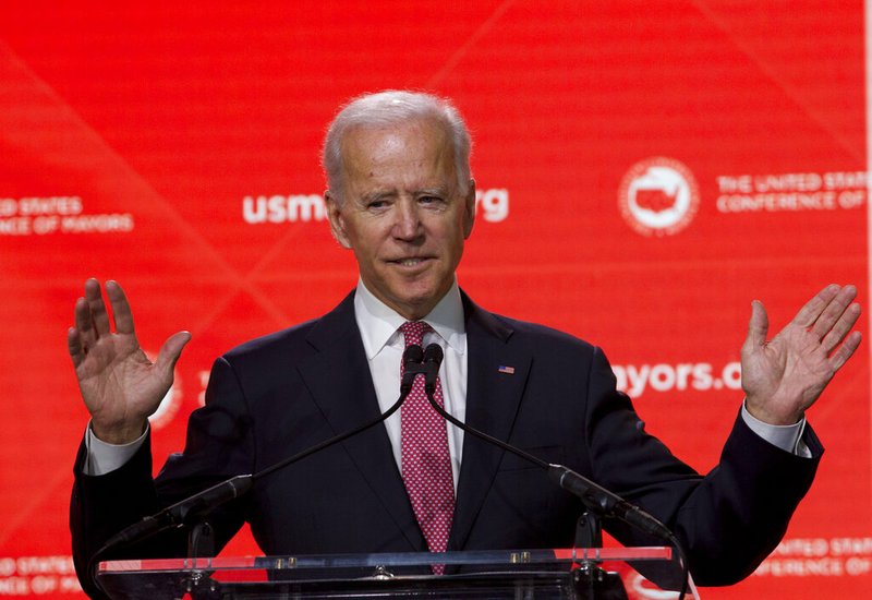 In this Jan. 24, 2019, file photo, Former Vice President Joe Biden speaks during the U.S. Conference of Mayors Annual Winter Meeting in Washington. Democratic presidential candidates are touting their support for "Medicare-for-all," higher taxes on the wealthy and a war on climate change. But foreign policy is largely taking a back seat. Biden is seizing on that opening to position himself as the global policy expert if he decides to run for president. (AP Photo/Jose Luis Magana, File)